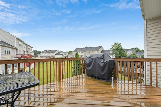 9808 Rainsong Dr, Wake Forest, NC 27587 - wooden deck with a residential view, grilling area, and a lawn