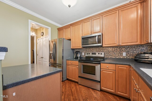 9808 Rainsong Dr, Wake Forest, NC 27587 - kitchen featuring appliances with stainless steel finishes, dark countertops, ornamental molding, decorative backsplash, and dark wood-style floors