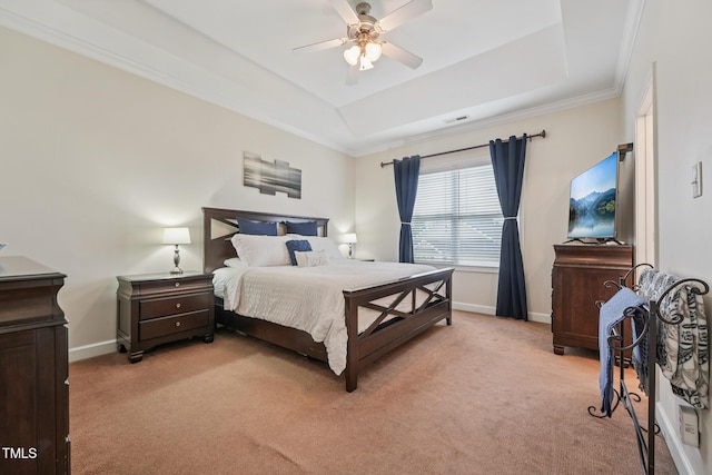 9808 Rainsong Dr, Wake Forest, NC 27587 - bedroom featuring a raised ceiling, light colored carpet, baseboards, crown molding, and a ceiling fan