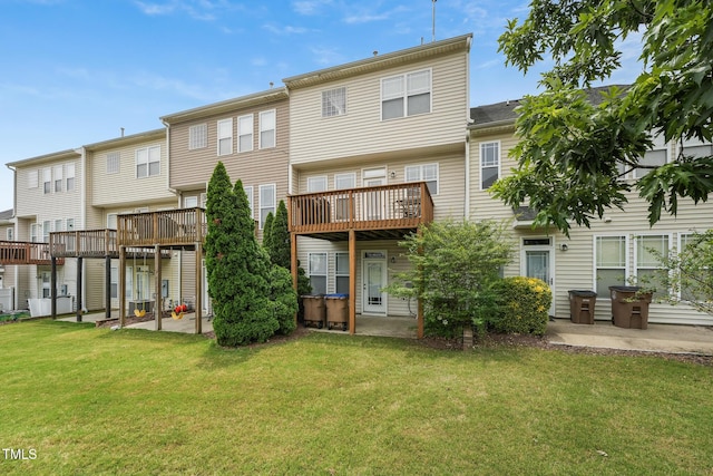 9808 Rainsong Dr, Wake Forest, NC 27587 - back of property with a patio, a yard, and a deck