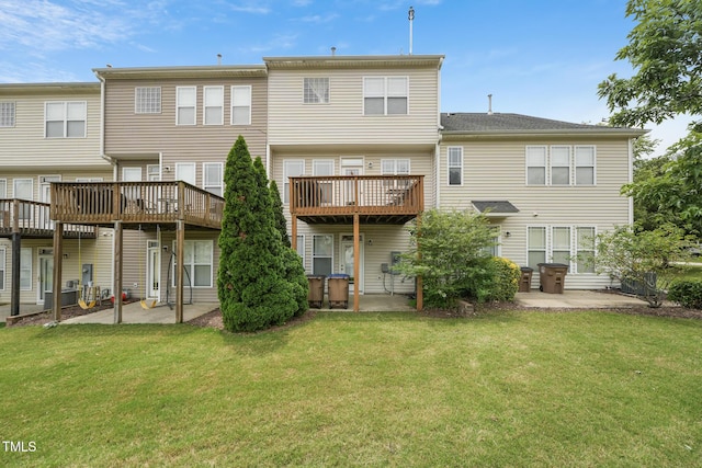9808 Rainsong Dr, Wake Forest, NC 27587 - rear view of property featuring a patio, a lawn, and a wooden deck