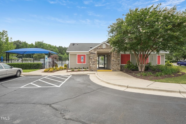 9808 Rainsong Dr, Wake Forest, NC 27587 - view of building exterior featuring uncovered parking