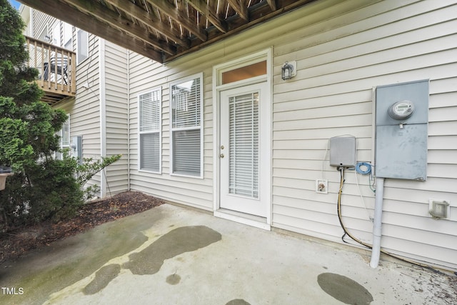 9808 Rainsong Dr, Wake Forest, NC 27587 - view of exterior entry featuring a patio area