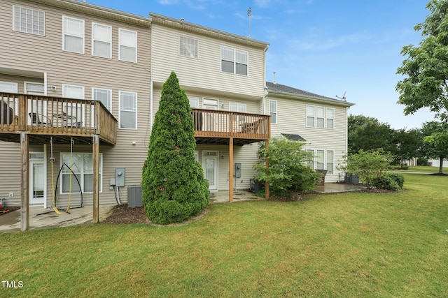 9808 Rainsong Dr, Wake Forest, NC 27587 - back of house featuring cooling unit, a lawn, and a wooden deck