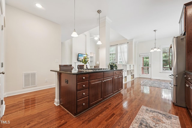 7 Teahouse Ct, Durham, NC 27707 - kitchen featuring stainless steel appliances, baseboards, dark wood-style flooring, dark brown cabinets, and hanging light fixtures