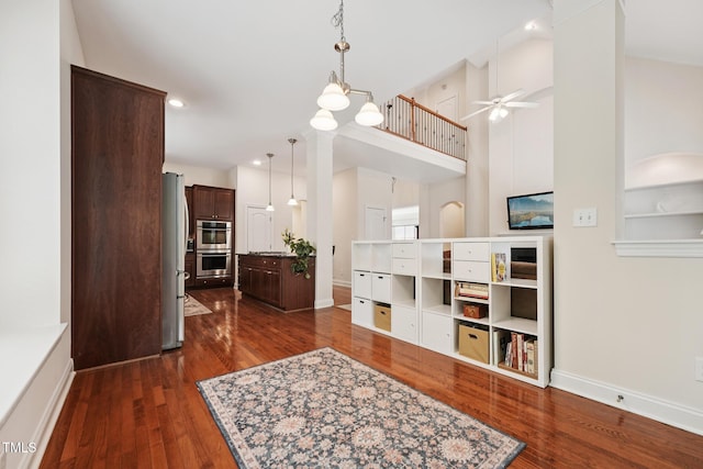7 Teahouse Ct, Durham, NC 27707 - kitchen featuring a ceiling fan, dark brown cabinetry, appliances with stainless steel finishes, dark wood finished floors, and recessed lighting