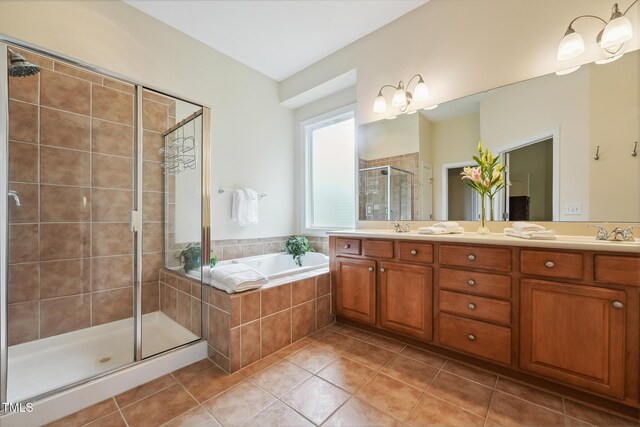 7 Teahouse Ct, Durham, NC 27707 - full bathroom featuring a stall shower, tile patterned floors, double vanity, and a garden tub