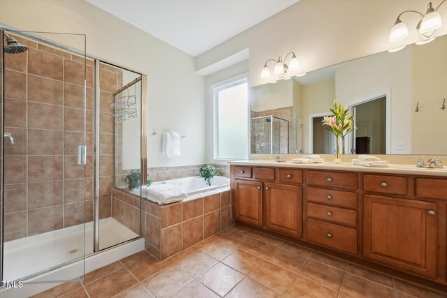 7 Teahouse Ct, Durham, NC 27707 - full bath featuring a shower stall, double vanity, tile patterned flooring, and a garden tub
