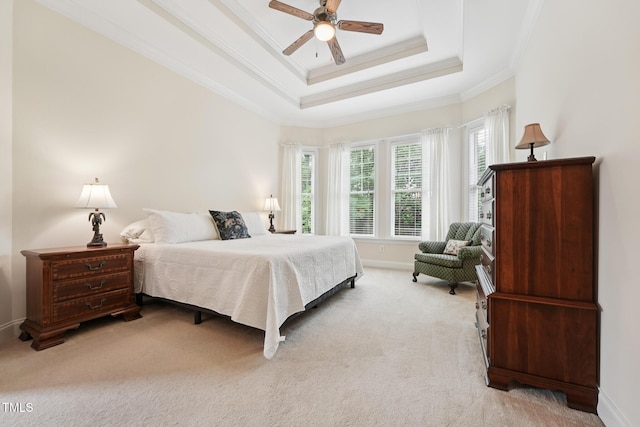 7 Teahouse Ct, Durham, NC 27707 - bedroom with light colored carpet, ornamental molding, baseboards, a ceiling fan, and a raised ceiling