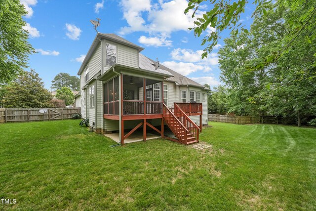7 Teahouse Ct, Durham, NC 27707 - rear view of house with a sunroom, stairway, and a deck