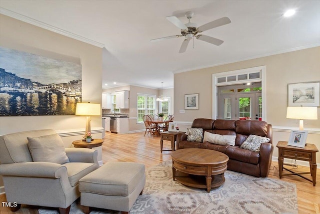 103 Rose Sky Ct, Cary, NC 27513 - living area featuring crown molding, light wood-style flooring, a ceiling fan, recessed lighting, and a chandelier
