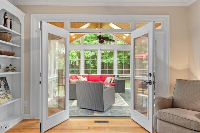 103 Rose Sky Ct, Cary, NC 27513 - doorway with healthy amount of natural light, french doors, wood finished floors, crown molding, and a ceiling fan