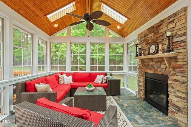103 Rose Sky Ct, Cary, NC 27513 - sunroom / solarium featuring a skylight, ceiling fan, vaulted ceiling, and an outdoor living space with a fireplace