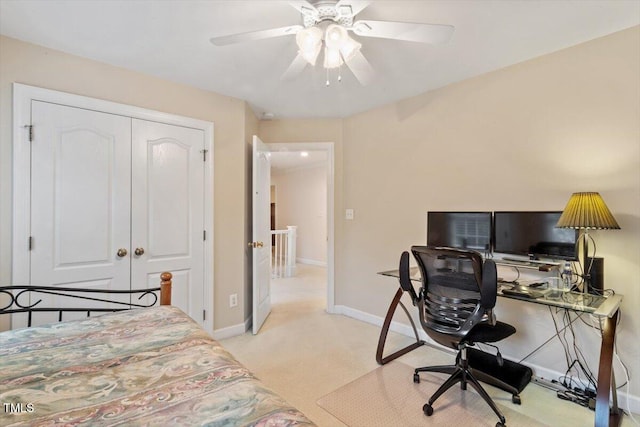 103 Rose Sky Ct, Cary, NC 27513 - bedroom featuring an office area, light colored carpet, baseboards, a closet, and ceiling fan
