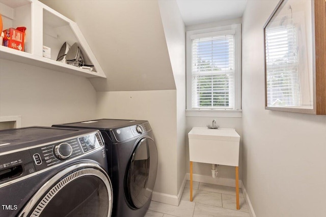 103 Rose Sky Ct, Cary, NC 27513 - washroom featuring washing machine and clothes dryer, tile patterned flooring, and baseboards