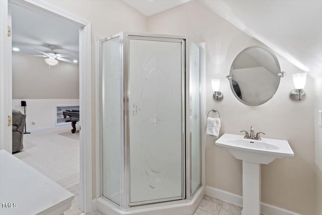 103 Rose Sky Ct, Cary, NC 27513 - bathroom featuring a stall shower, baseboards, ceiling fan, and vaulted ceiling