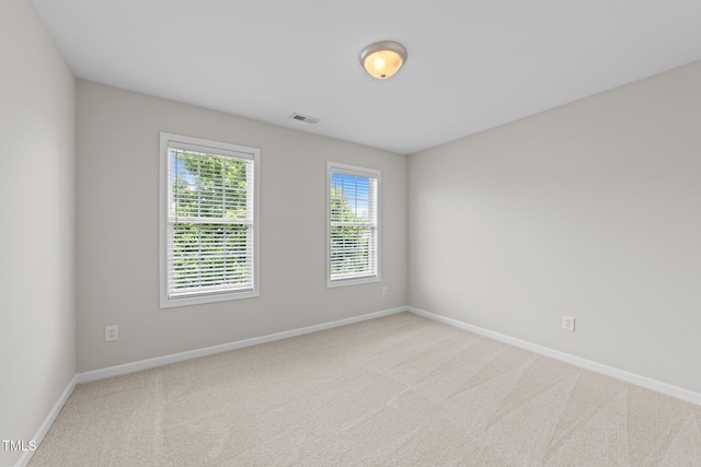 5942 Big Nance Dr, Raleigh, NC 27616 - spare room featuring baseboards and carpet floors