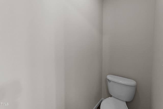 5942 Big Nance Dr, Raleigh, NC 27616 - bathroom featuring toilet and baseboards