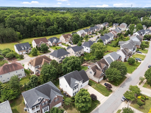 5942 Big Nance Dr, Raleigh, NC 27616 - aerial perspective of suburban area with a heavily wooded area