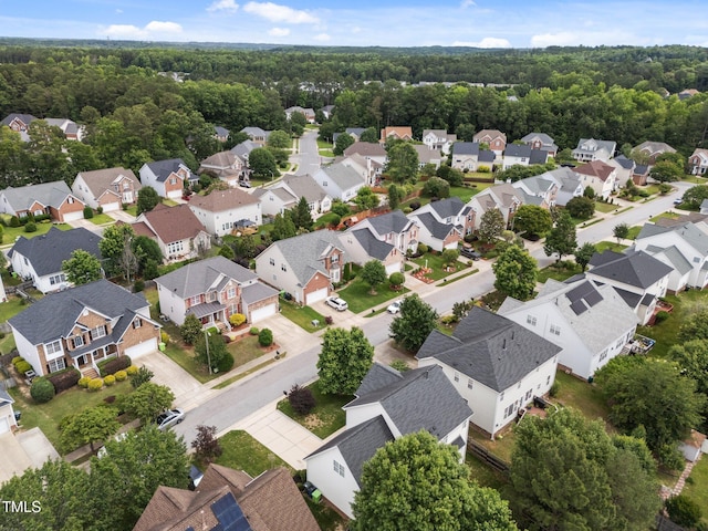 5942 Big Nance Dr, Raleigh, NC 27616 - aerial perspective of suburban area featuring a heavily wooded area
