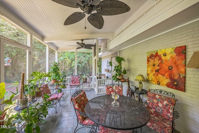 582 Wimbleton Dr, Raleigh, NC 27609 - sunroom / solarium with a ceiling fan, outdoor dining space, healthy amount of natural light, and beam ceiling