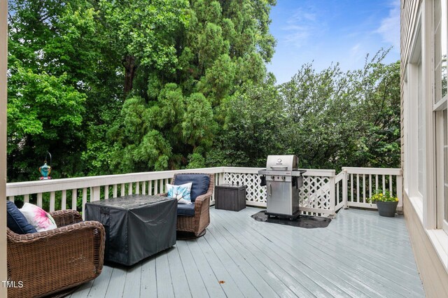 13121 Sargas St, Raleigh, NC 27614 - wooden terrace featuring a grill and view of scattered trees