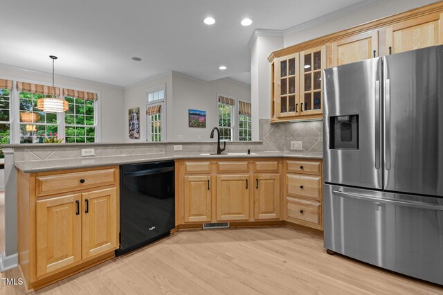 13121 Sargas St, Raleigh, NC 27614 - kitchen featuring stainless steel fridge, dishwasher, a sink, light wood-style flooring, and tasteful backsplash