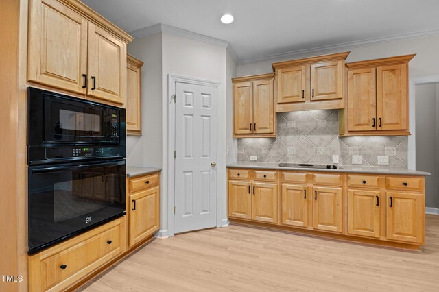 13121 Sargas St, Raleigh, NC 27614 - kitchen featuring black appliances, light wood-style floors, crown molding, backsplash, and light countertops
