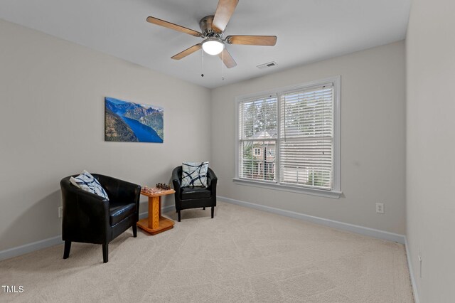 13121 Sargas St, Raleigh, NC 27614 - sitting room featuring baseboards, carpet floors, and a ceiling fan