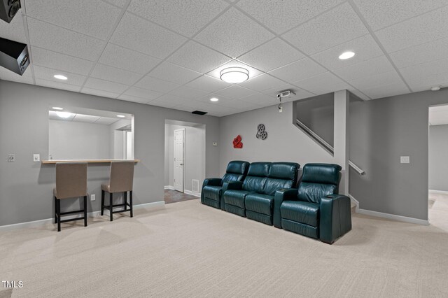 13121 Sargas St, Raleigh, NC 27614 - carpeted home theater room featuring baseboards, a paneled ceiling, recessed lighting, and bar area