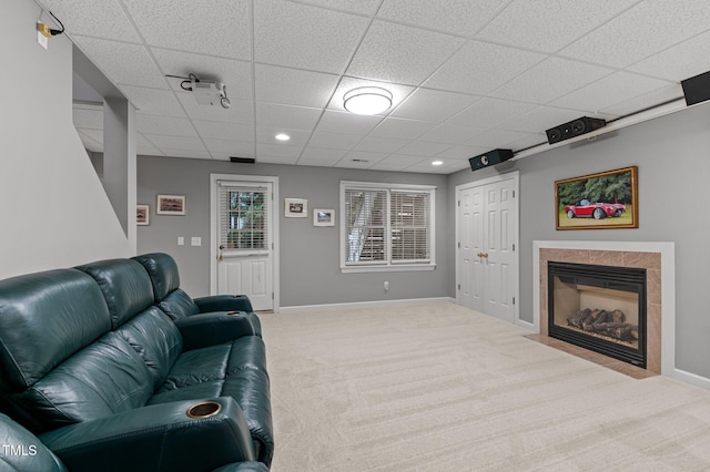13121 Sargas St, Raleigh, NC 27614 - living room featuring carpet flooring, a drop ceiling, a high end fireplace, and baseboards