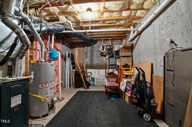 13121 Sargas St, Raleigh, NC 27614 - unfinished below grade area featuring water heater