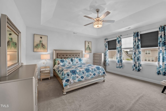 40 Two Creeks Loop, Chapel Hill, NC 27517 - bedroom featuring carpet floors, a raised ceiling, and a ceiling fan