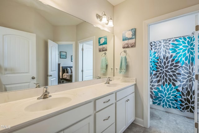40 Two Creeks Loop, Chapel Hill, NC 27517 - bathroom featuring double vanity and toilet