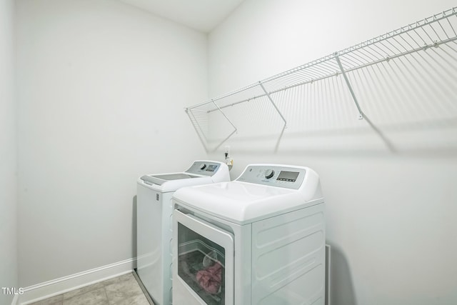 40 Two Creeks Loop, Chapel Hill, NC 27517 - laundry area with separate washer and dryer and baseboards