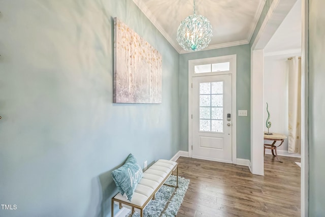 40 Two Creeks Loop, Chapel Hill, NC 27517 - entryway featuring ornamental molding, a chandelier, and wood finished floors