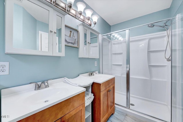838 Joyner Ct, Wake Forest, NC 27587 - bathroom with two vanities, a stall shower, and marble finish flooring