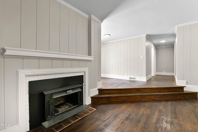 519 W Raleigh St, Siler City, NC 27344 - detailed view of crown molding, wood finished floors, baseboards, and a decorative wall
