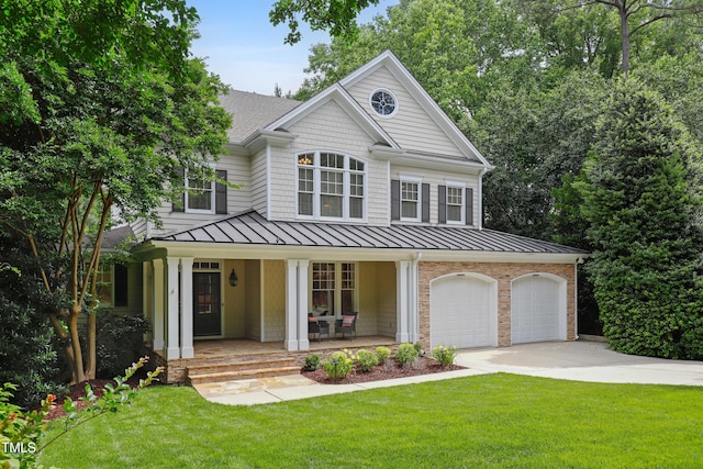 118 Killingsworth Dr, Cary, NC 27518 - view of front of home with a standing seam roof, covered porch, concrete driveway, a front yard, and roof with shingles