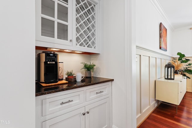 118 Killingsworth Dr, Cary, NC 27518 - bar featuring ornamental molding and dark wood finished floors