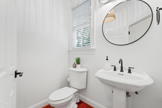 118 Killingsworth Dr, Cary, NC 27518 - bathroom featuring toilet and baseboards