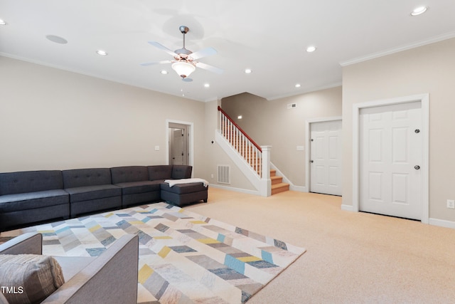 118 Killingsworth Dr, Cary, NC 27518 - living area with stairs, recessed lighting, ceiling fan, ornamental molding, and light carpet