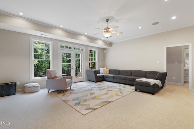 118 Killingsworth Dr, Cary, NC 27518 - living area featuring light carpet, plenty of natural light, recessed lighting, crown molding, and a ceiling fan