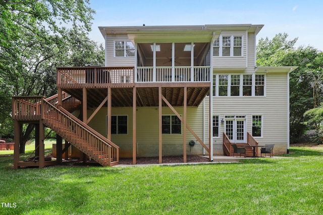 118 Killingsworth Dr, Cary, NC 27518 - back of house featuring stairway, a wooden deck, a sunroom, and a lawn