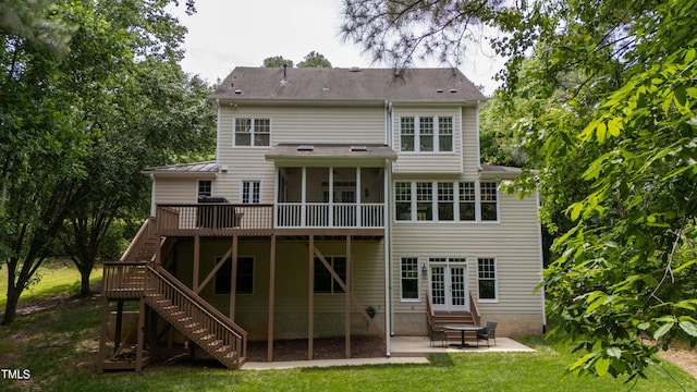 118 Killingsworth Dr, Cary, NC 27518 - rear view of property with stairs, a patio, a wooden deck, a yard, and a sunroom