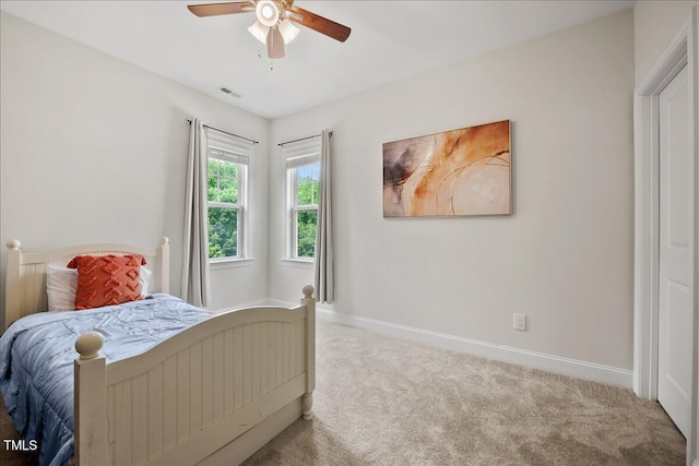 2256 Toad Hollow Trl, Apex, NC 27502 - bedroom featuring carpet flooring, baseboards, and ceiling fan