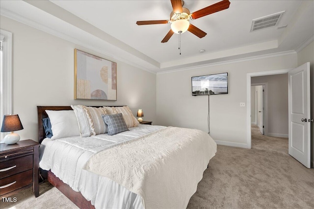 2256 Toad Hollow Trl, Apex, NC 27502 - bedroom with a raised ceiling, light colored carpet, baseboards, and a ceiling fan