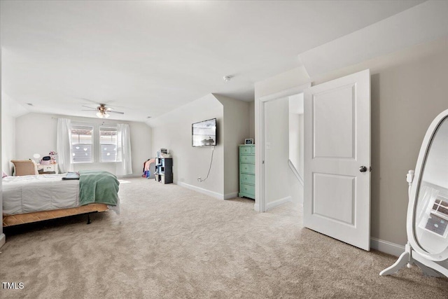 2256 Toad Hollow Trl, Apex, NC 27502 - bedroom featuring light carpet, baseboards, ceiling fan, and vaulted ceiling