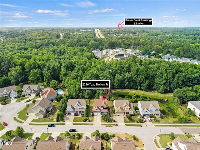2256 Toad Hollow Trl, Apex, NC 27502 - aerial perspective of suburban area with a heavily wooded area
