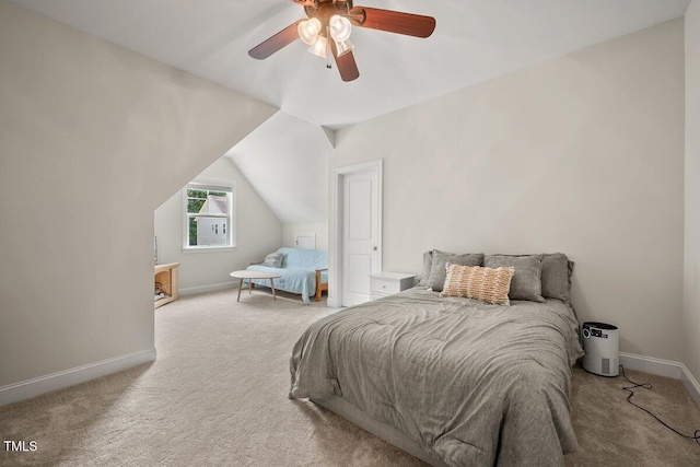 2256 Toad Hollow Trl, Apex, NC 27502 - carpeted bedroom with baseboards, ceiling fan, and lofted ceiling